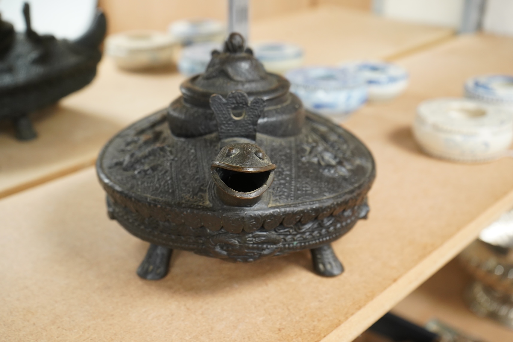 A Chinese cast bronze 'tortoise’ ritual tea kettle, 30cm long